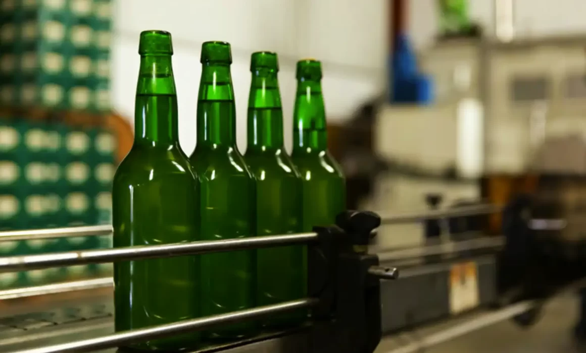 PRO Engineering tunnel pasteurizer processing non-alcoholic honey-based mead bottles