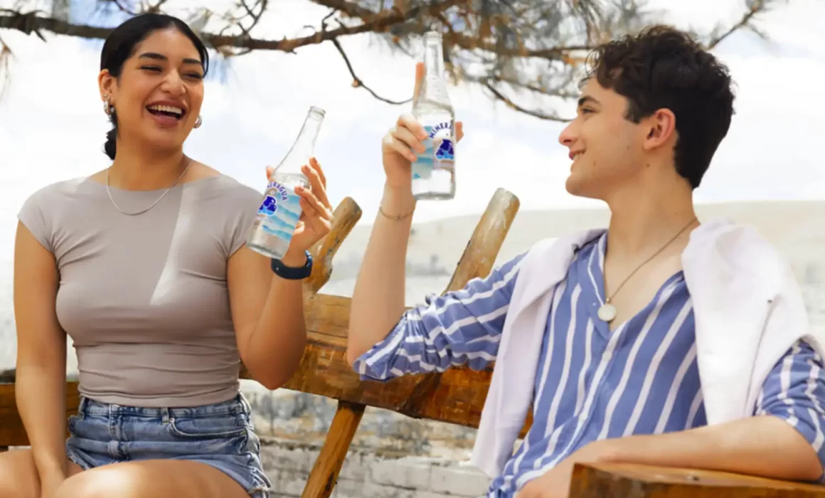 Images of people enjoying premium electrolyte hydration beverages pasteurized with Tunnel pasteurizer for functional hydration drinks