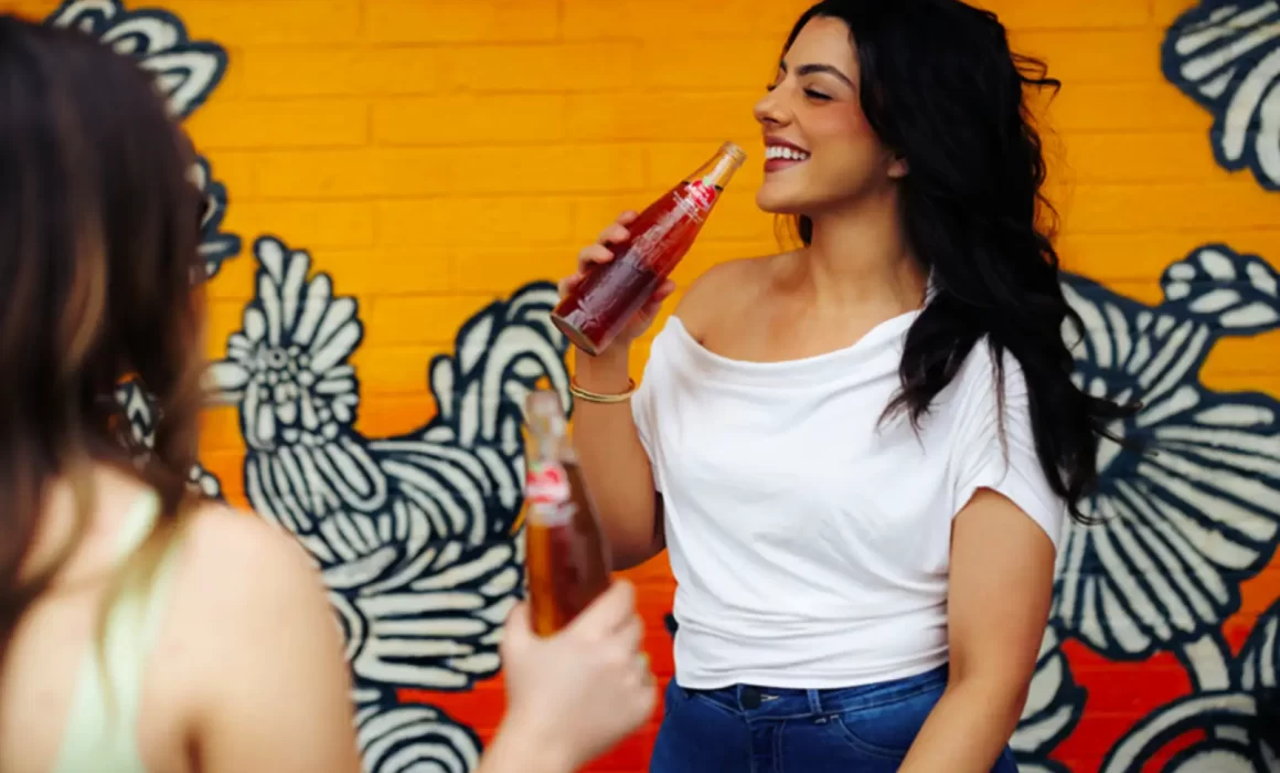 Couple drinking retro soda beverages