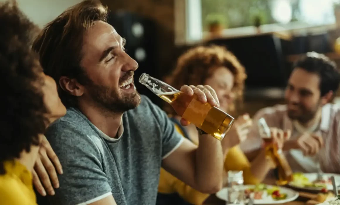 Image of person drinking a beverage for new article on SlimLine Tunnel Pasteurizer supporting sustainable beverage production