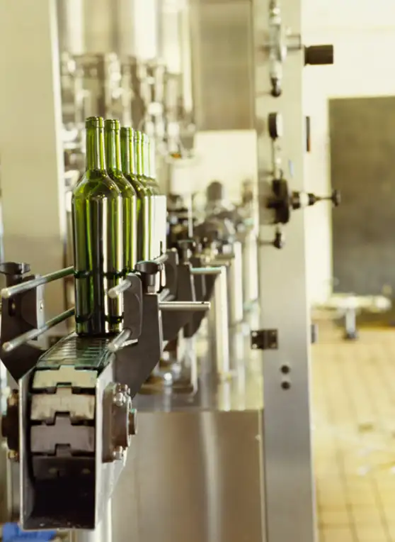 Image of bottles on a conveyer pasteurization for contract beverage manufacturing