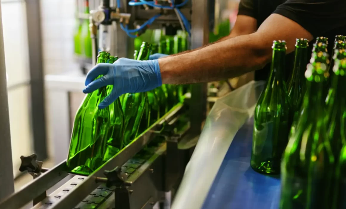 Image of bottles on flexible tunnel pasteurizer for beverage co-packer